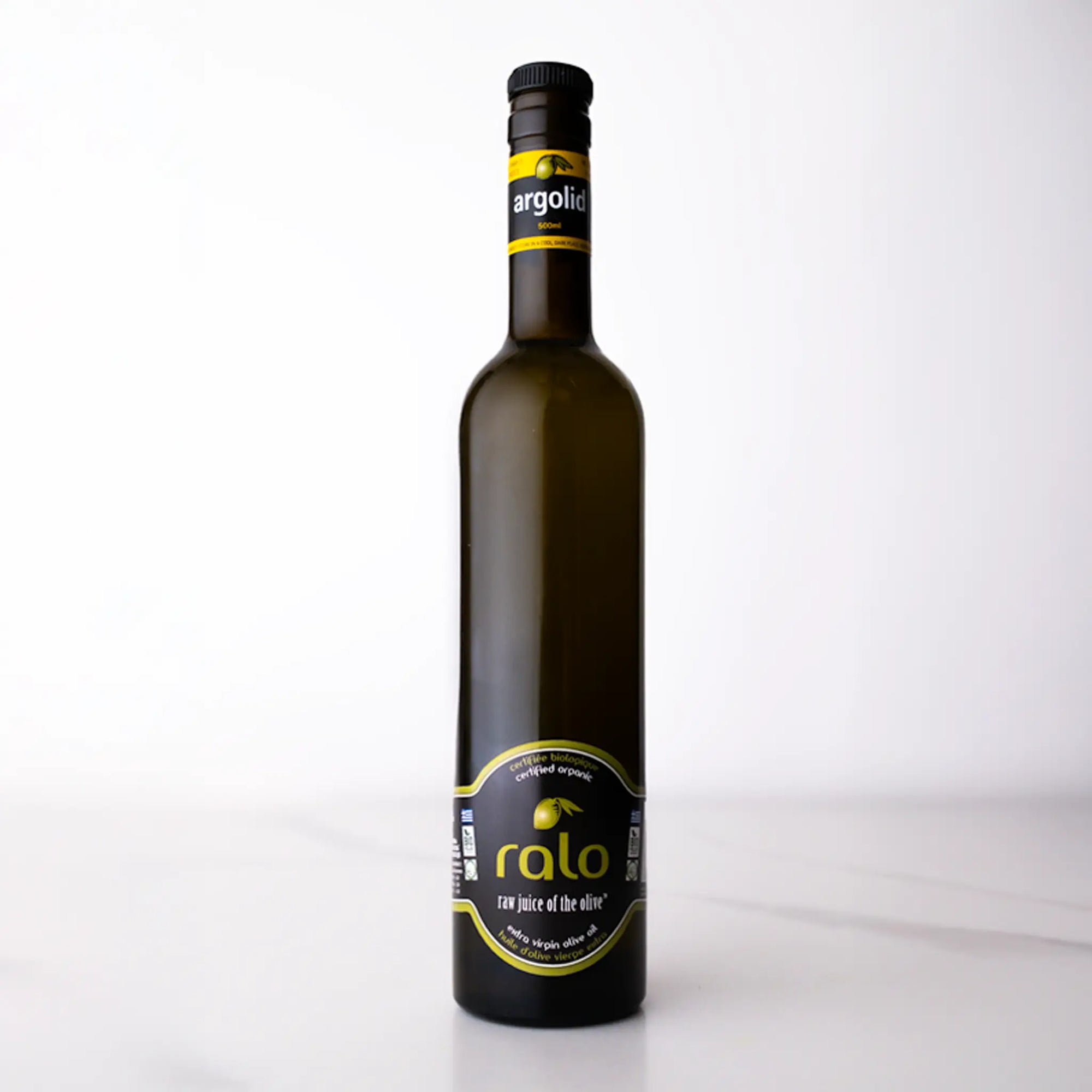 Bottle of Ralo olive oil with argolid label on a white background